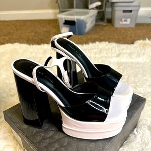 Black and white plate form heels